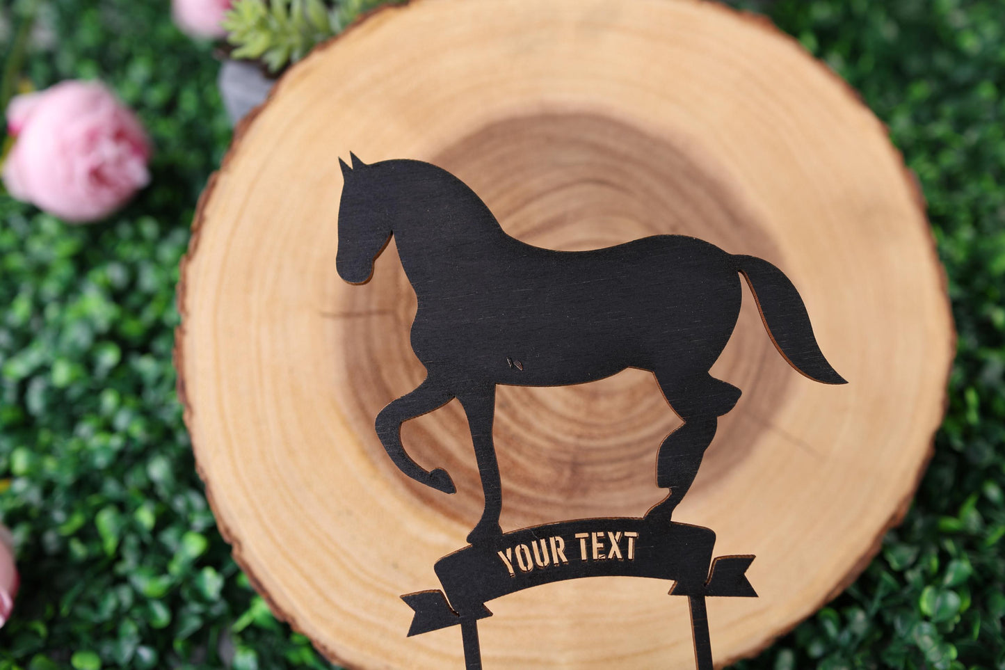 a wooden sign with a horse on it