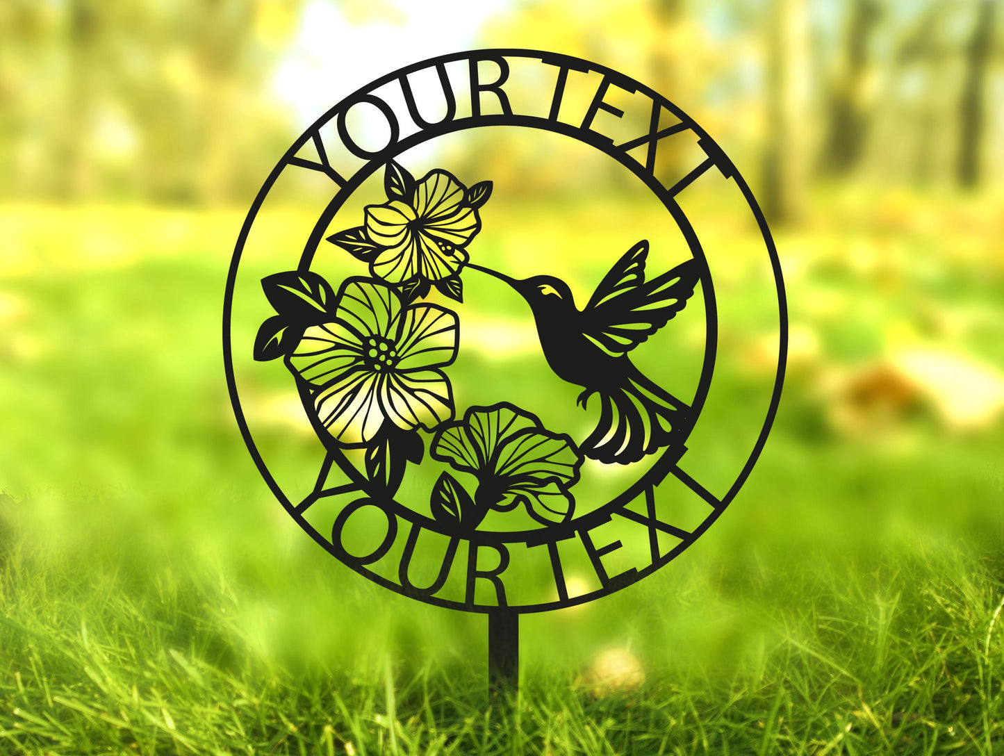 a metal sign with a bird and flowers on it