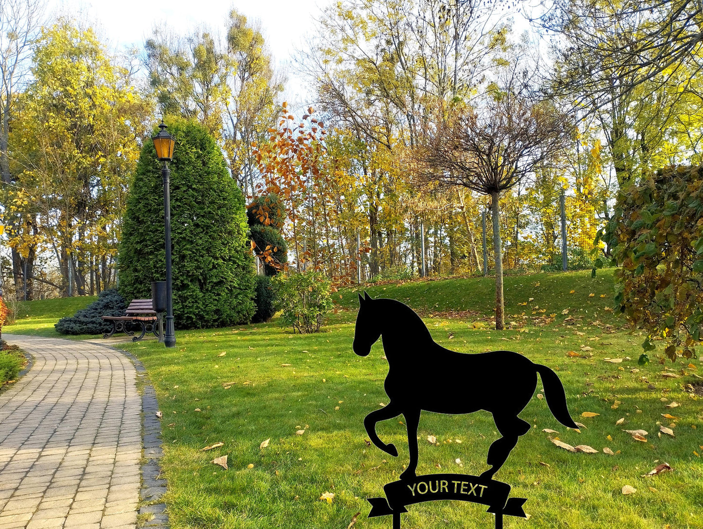 a statue of a horse on top of a sign