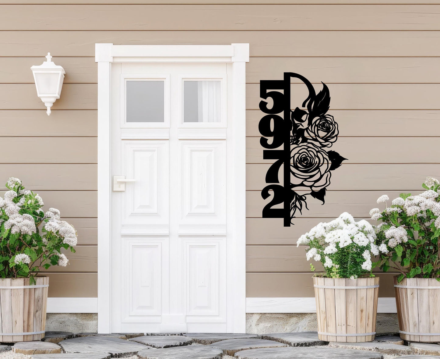 a white door with a black decal of a rose on it
