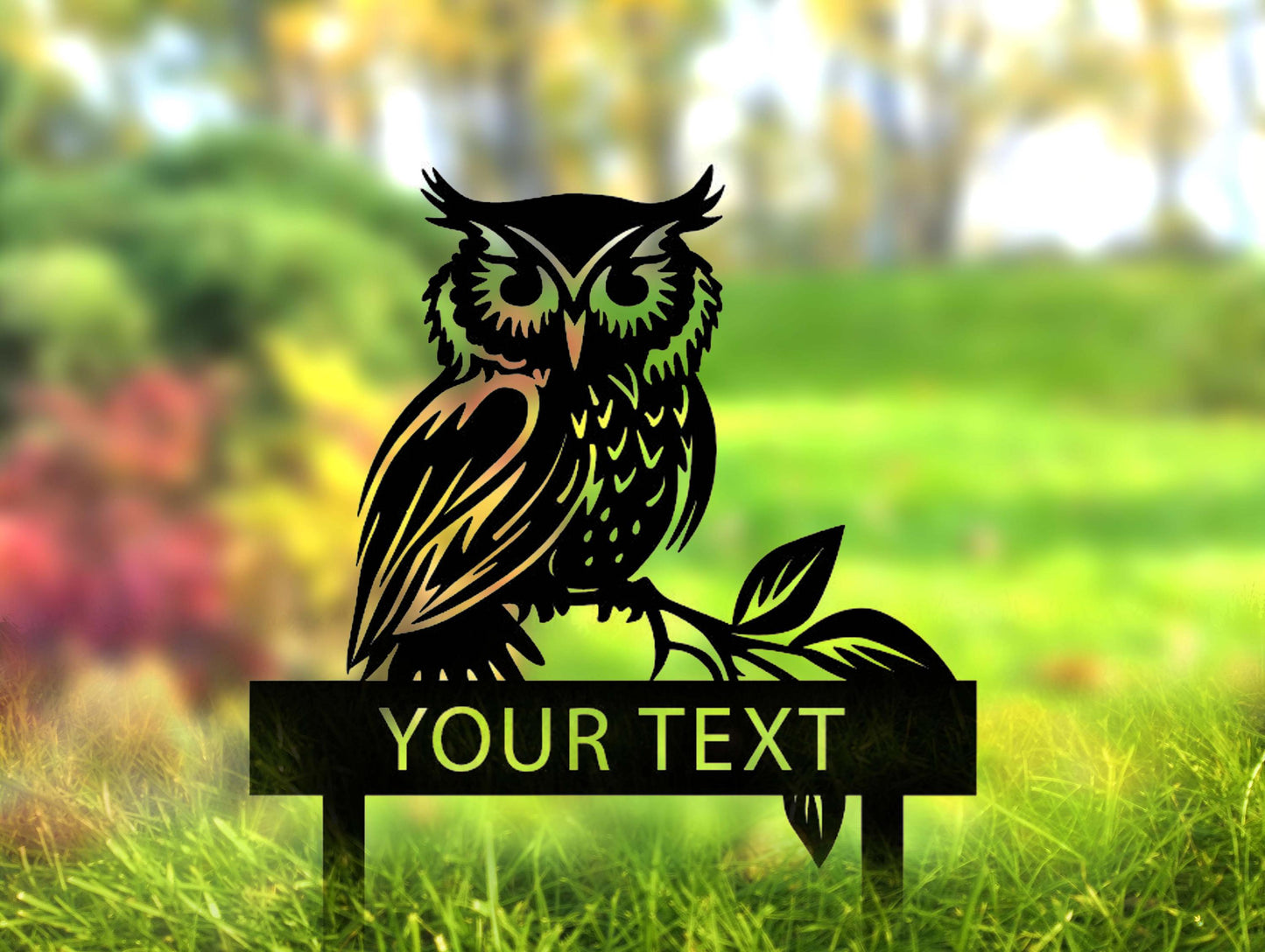 a picture of an owl sitting on a sign