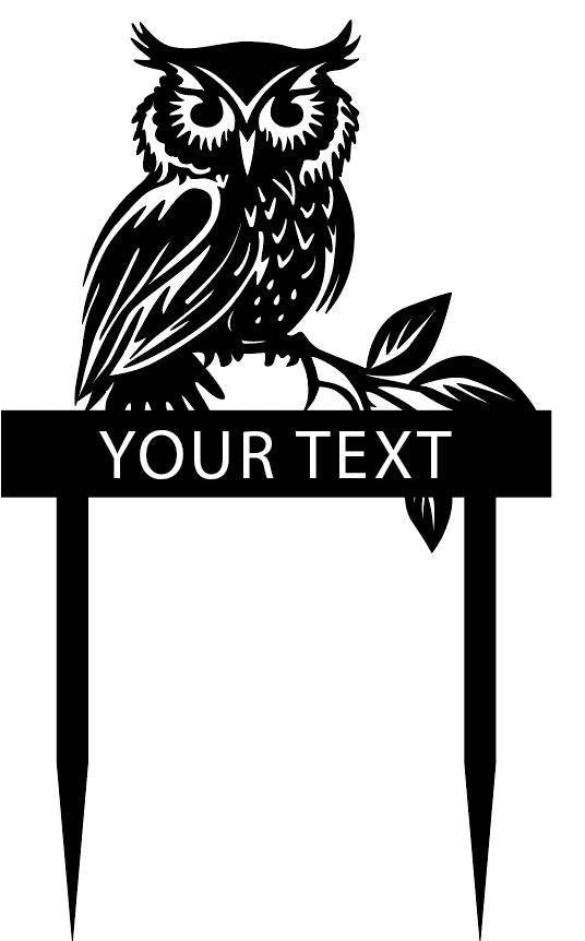 an owl sitting on top of a sign