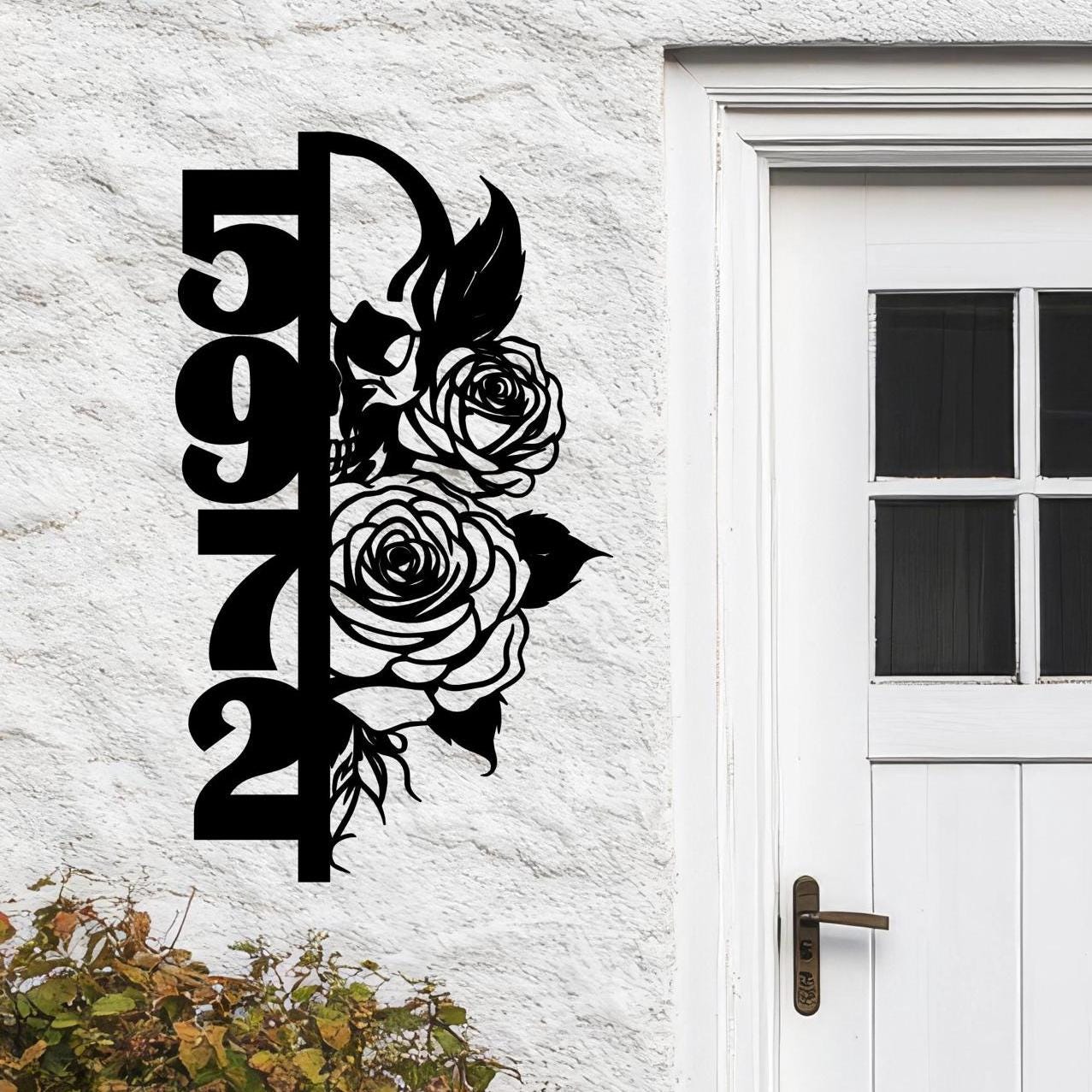 a white door with a flower design on it