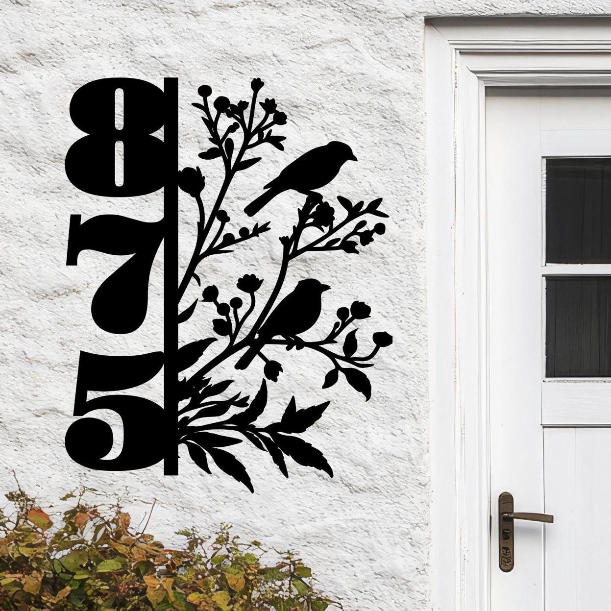 a white door with a black design on it