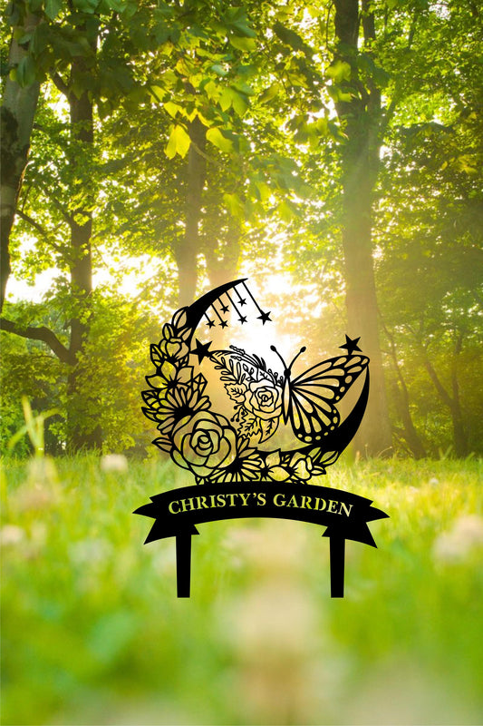 a clock in the middle of a field with trees in the background