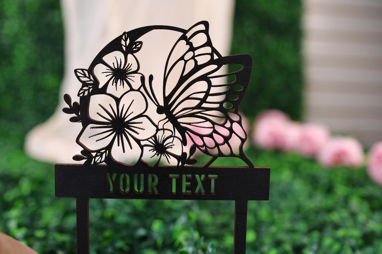 a close up of a sign with a butterfly on it