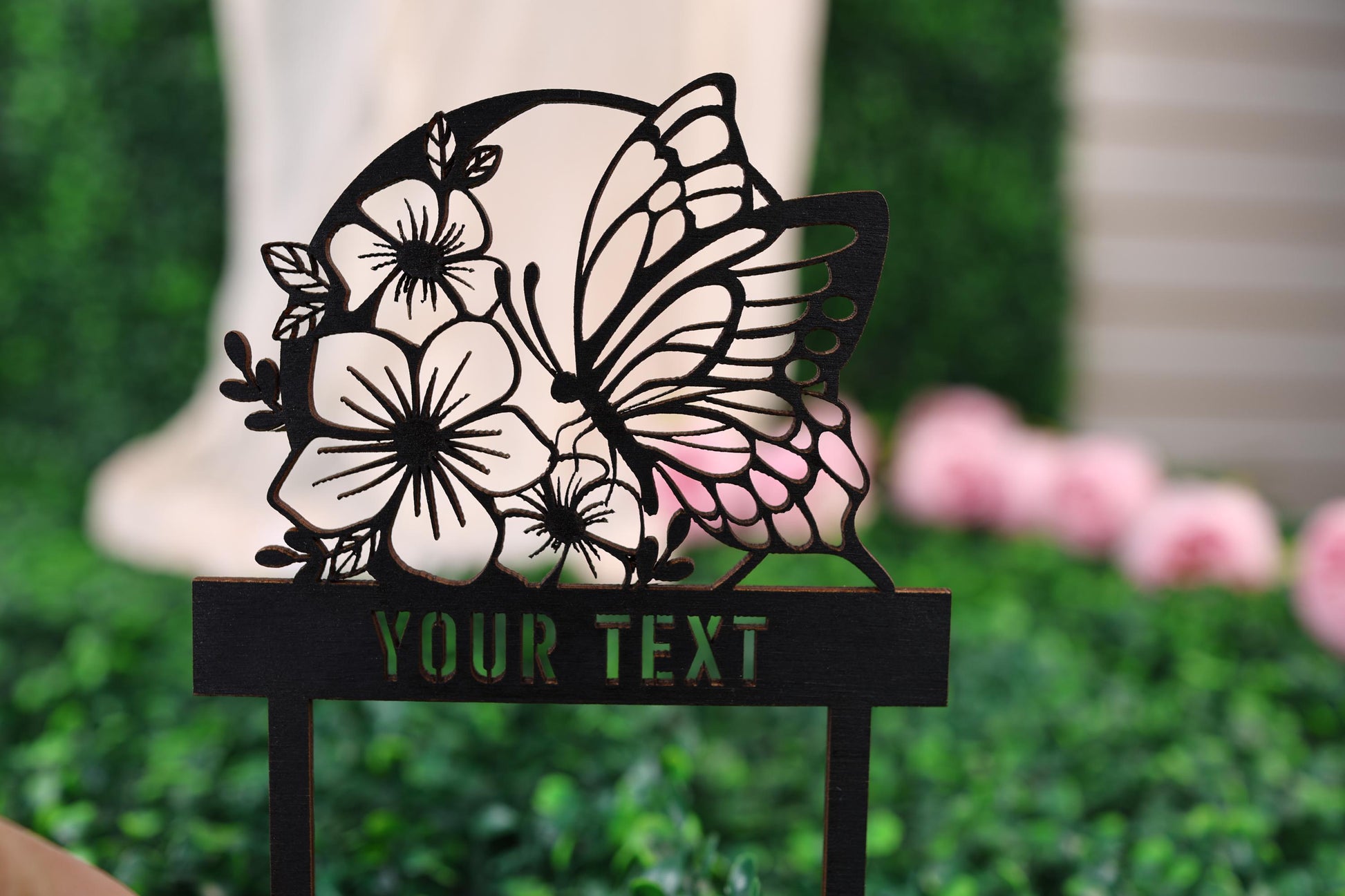 a close up of a sign with a butterfly on it