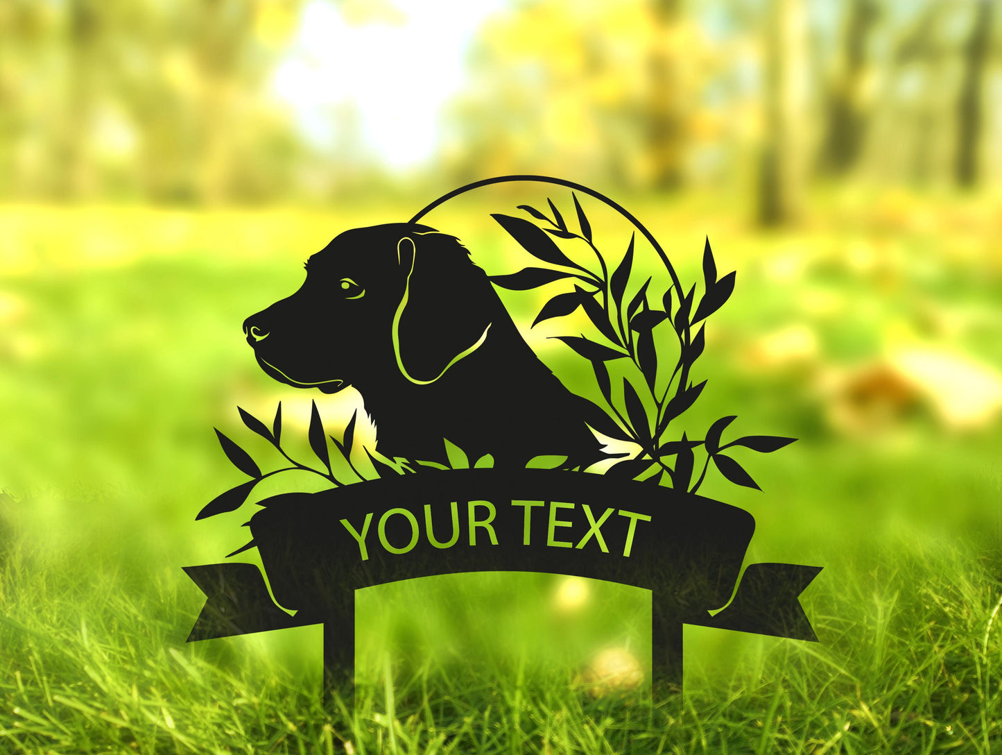 a black dog is sitting in the grass