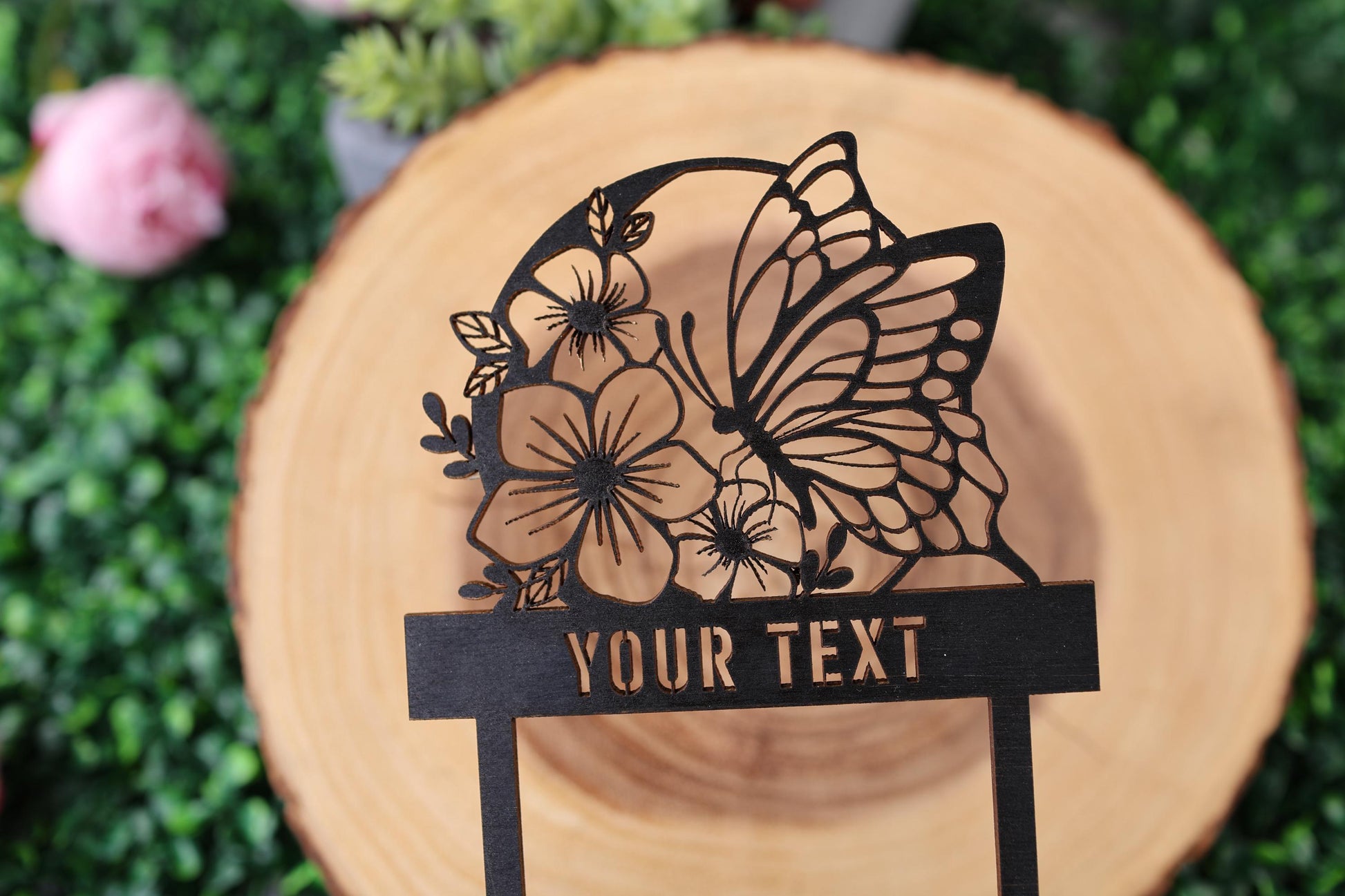 a close up of a sign with a butterfly on it