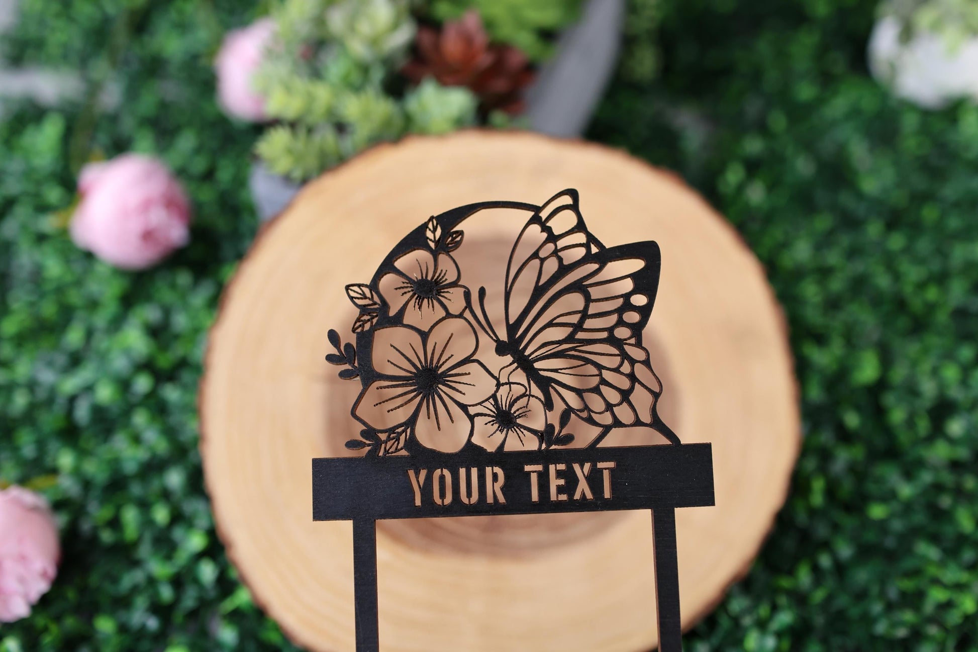 a close up of a sign with a butterfly on it